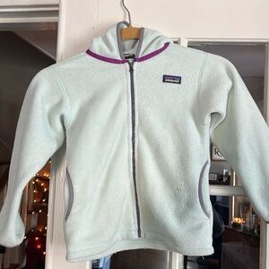 Patagonia Synchilla mint blue with purple detail and hood. Size 5T.